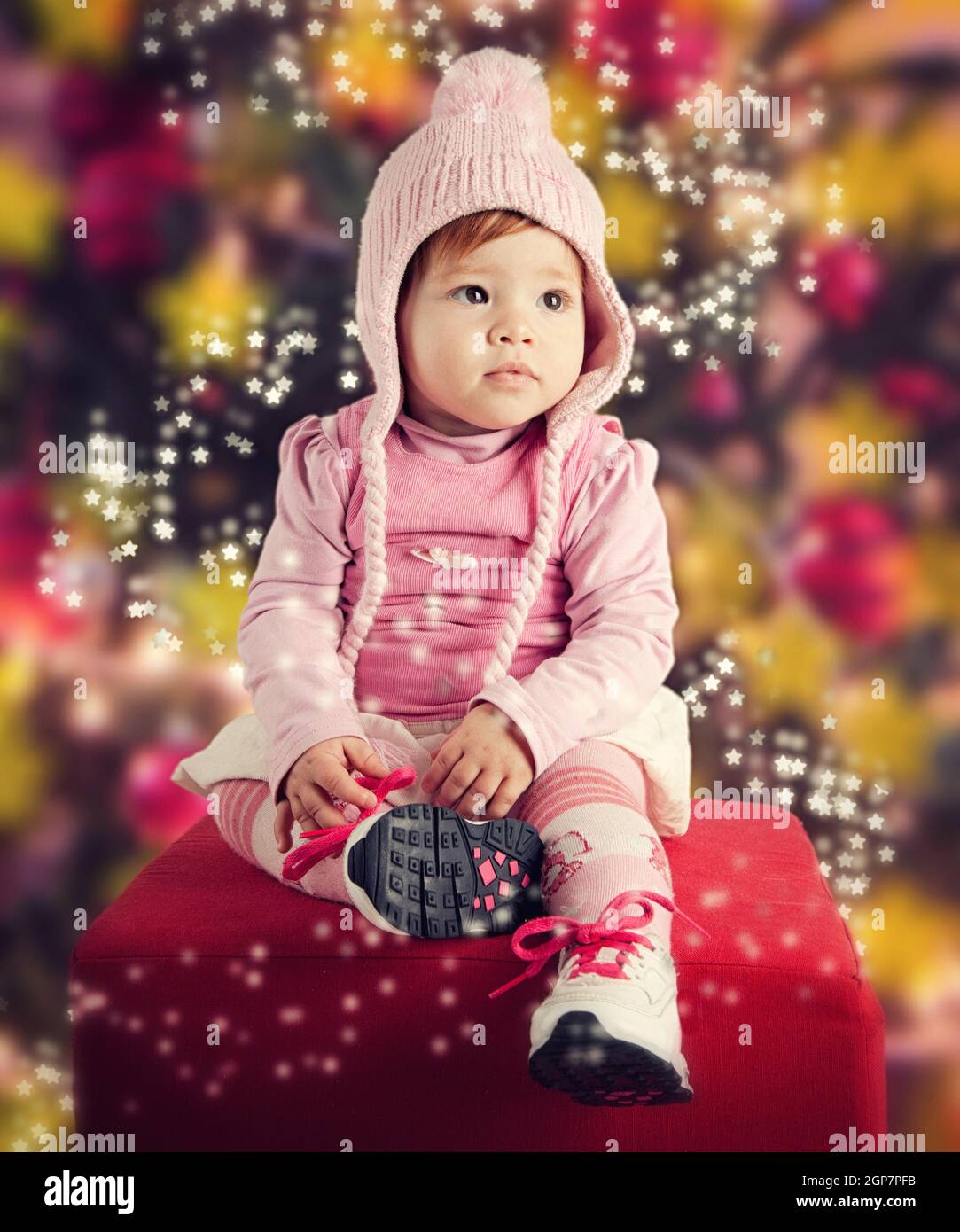 Cute baby with winter clothing in Christmas theme Stock Photo Alamy