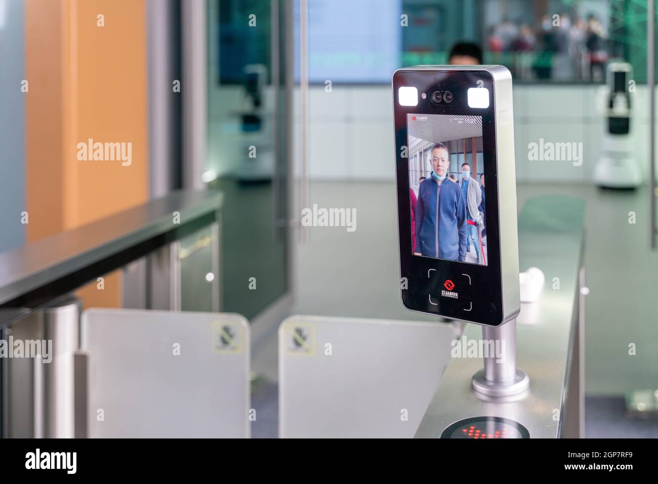 Human Check Gate CHONGQING, CHINA - Oct 03, 2020: A Chinese man using face ...