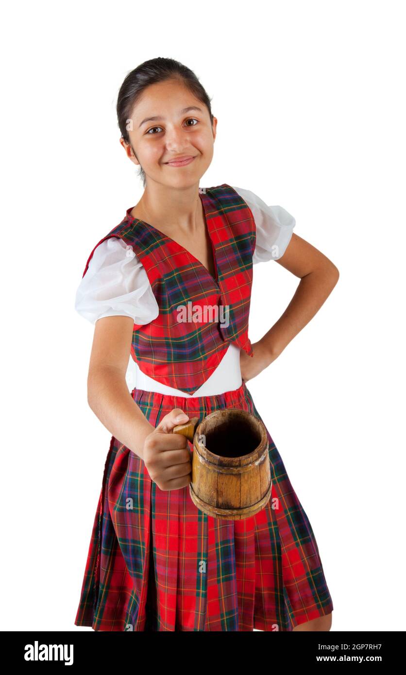 Teenager dressed with red plaid clothing and mug of beer on white background. Stock Photo