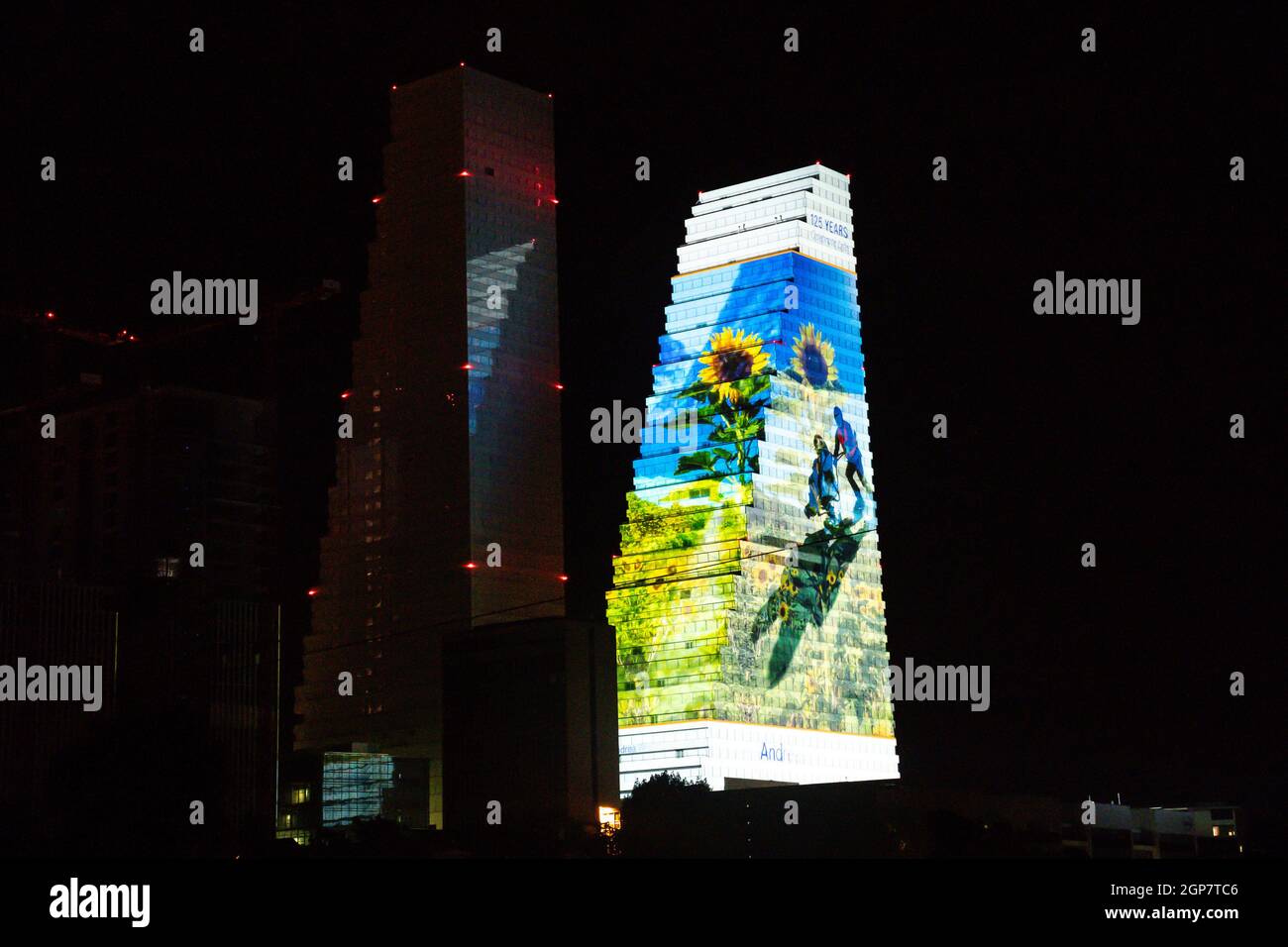 Basel, Switzerland. 28th Sep, 2021. The Roche Tower illuminated with images from around the world during the Tower Light Projection to celebrate 125 years of improving lives at Roche Tower in Basel, Switzerland. Credit: SPP Sport Press Photo. /Alamy Live News Stock Photo