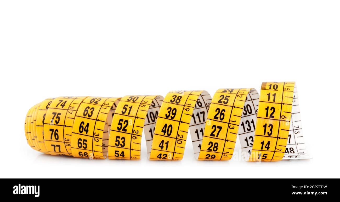 Yellow measuring tape isolated on white background Stock Photo