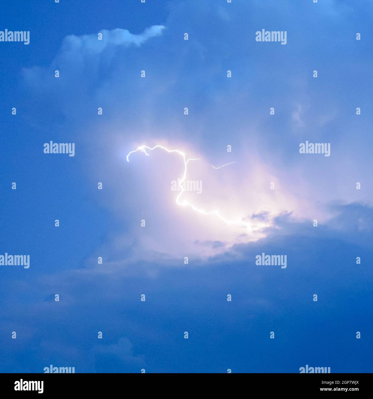 Lightnings in storm clouds. Peals of a thunder and the sparkling ...