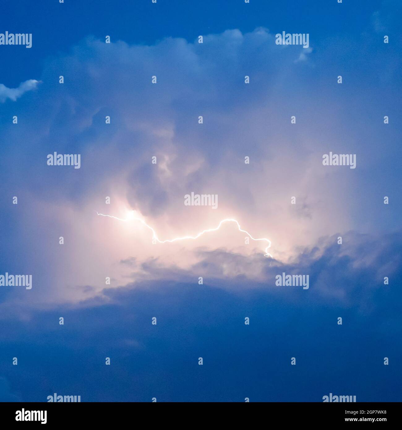 Lightnings in storm clouds. Peals of a thunder and the sparkling ...