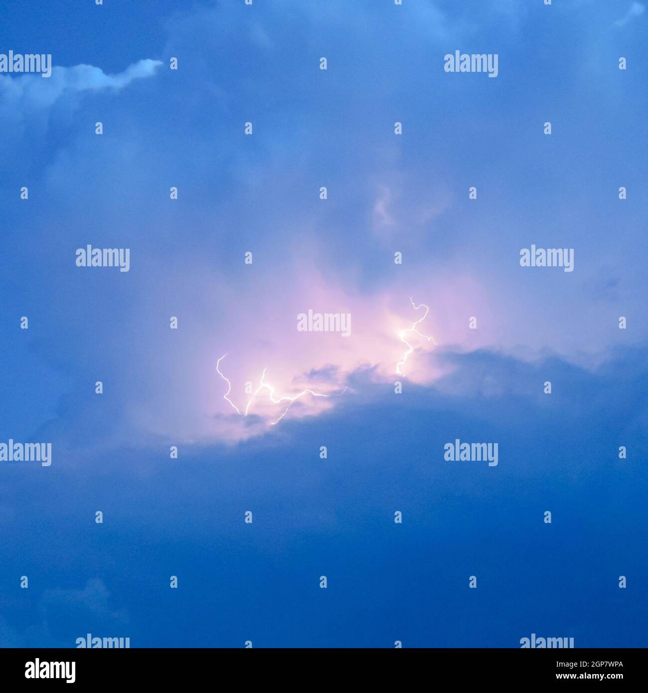 Lightnings in storm clouds. Peals of a thunder and the sparkling ...