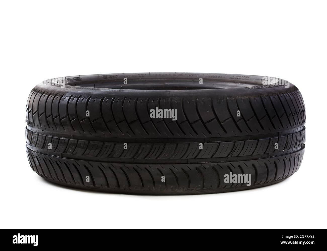 Tire that is nearing the end of it's useful life on a white background