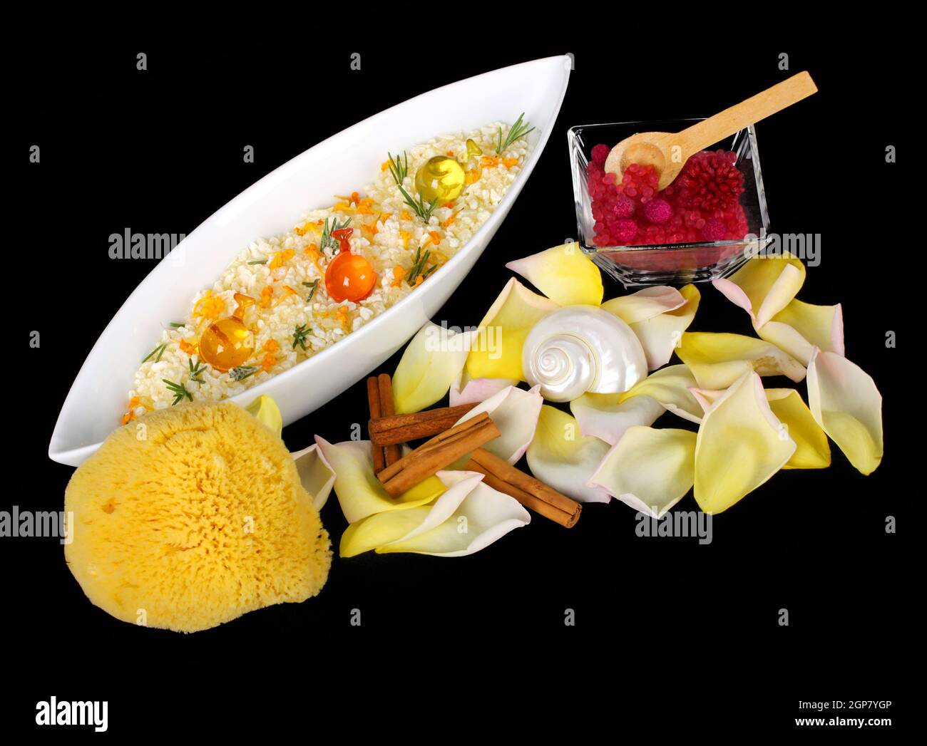 Salt bath with soap and flowers on black background Stock Photo Alamy