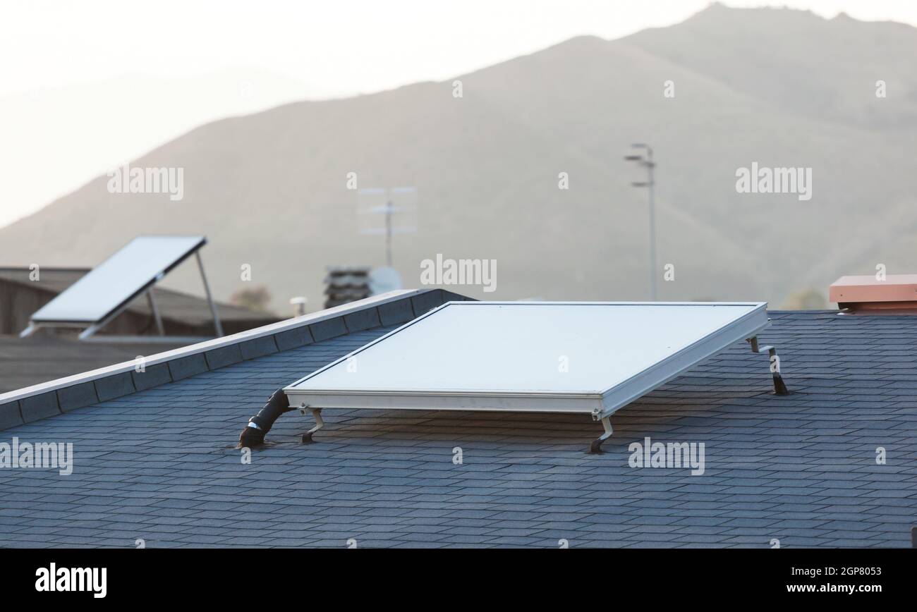 Solar panel for water heating system on the roof Stock Photo Alamy