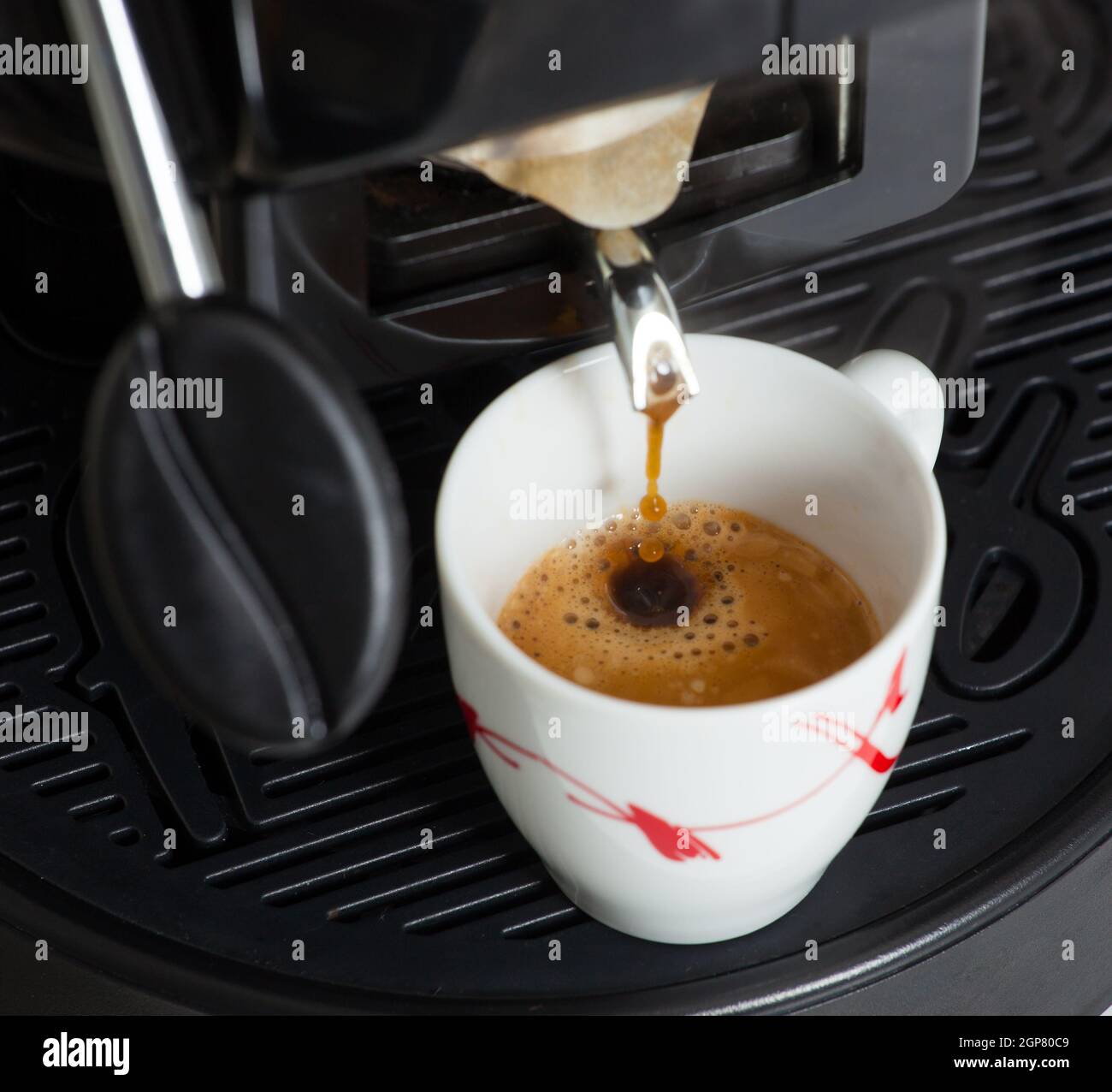 Espresso machine making coffee with paper pod Stock Photo Alamy
