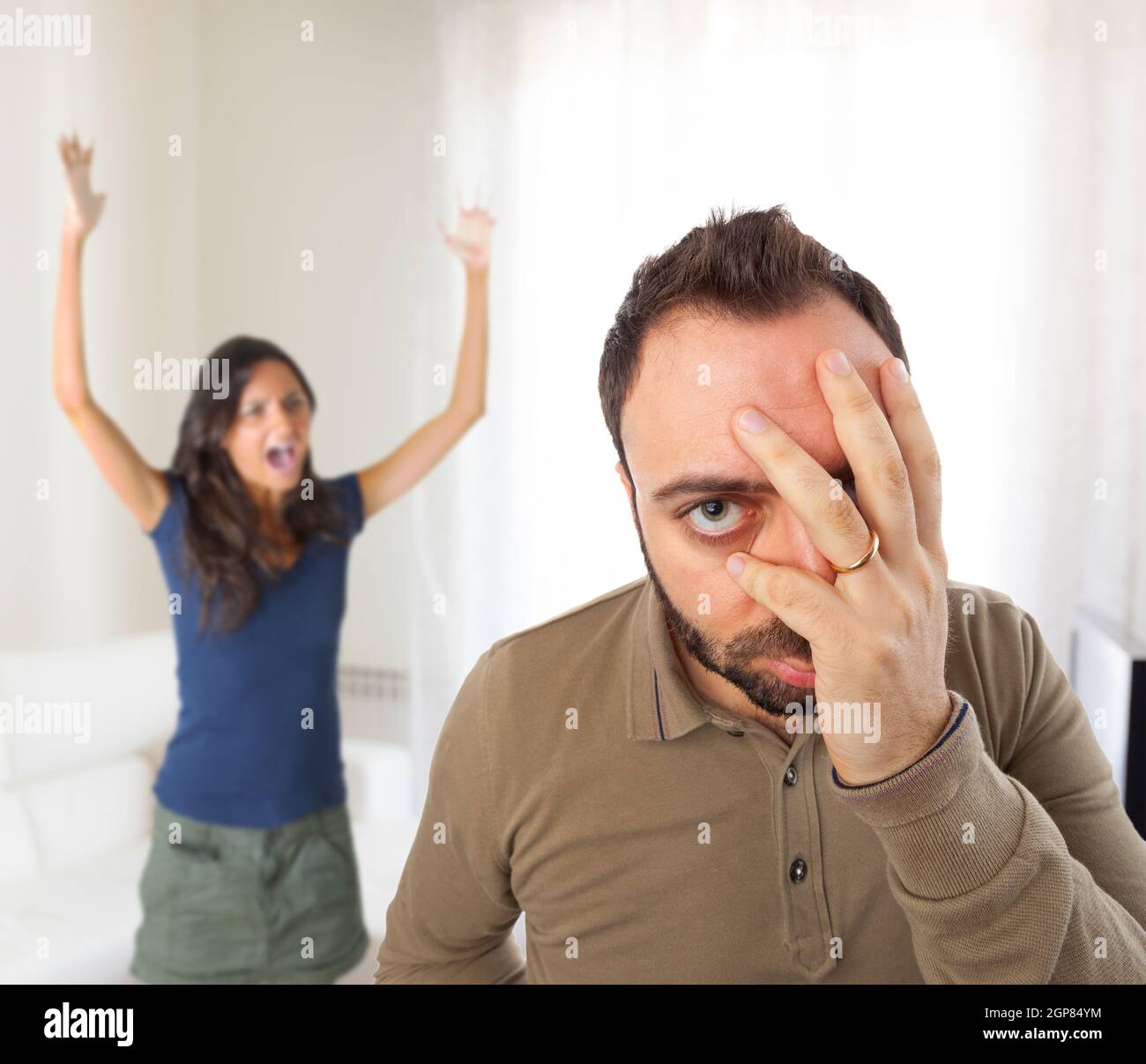 Relationship problems between husband and wife in the home Stock Photo