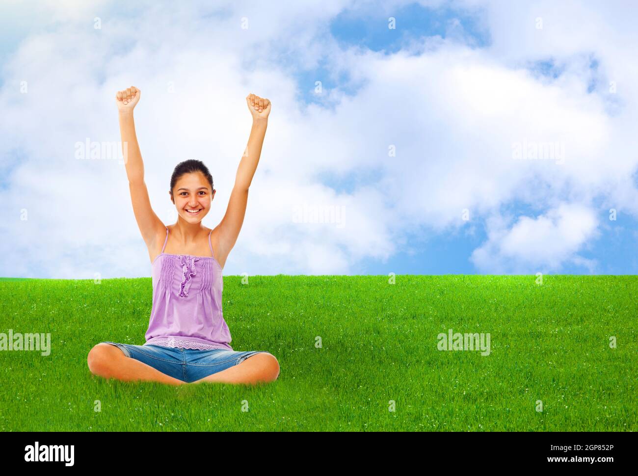 Girl sitting arms legs crossed hi-res stock photography and images - Alamy