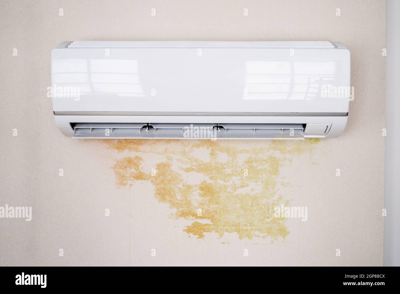 Leaky Air Conditioner And Water Damage On Wall At Home Stock Photo - Alamy