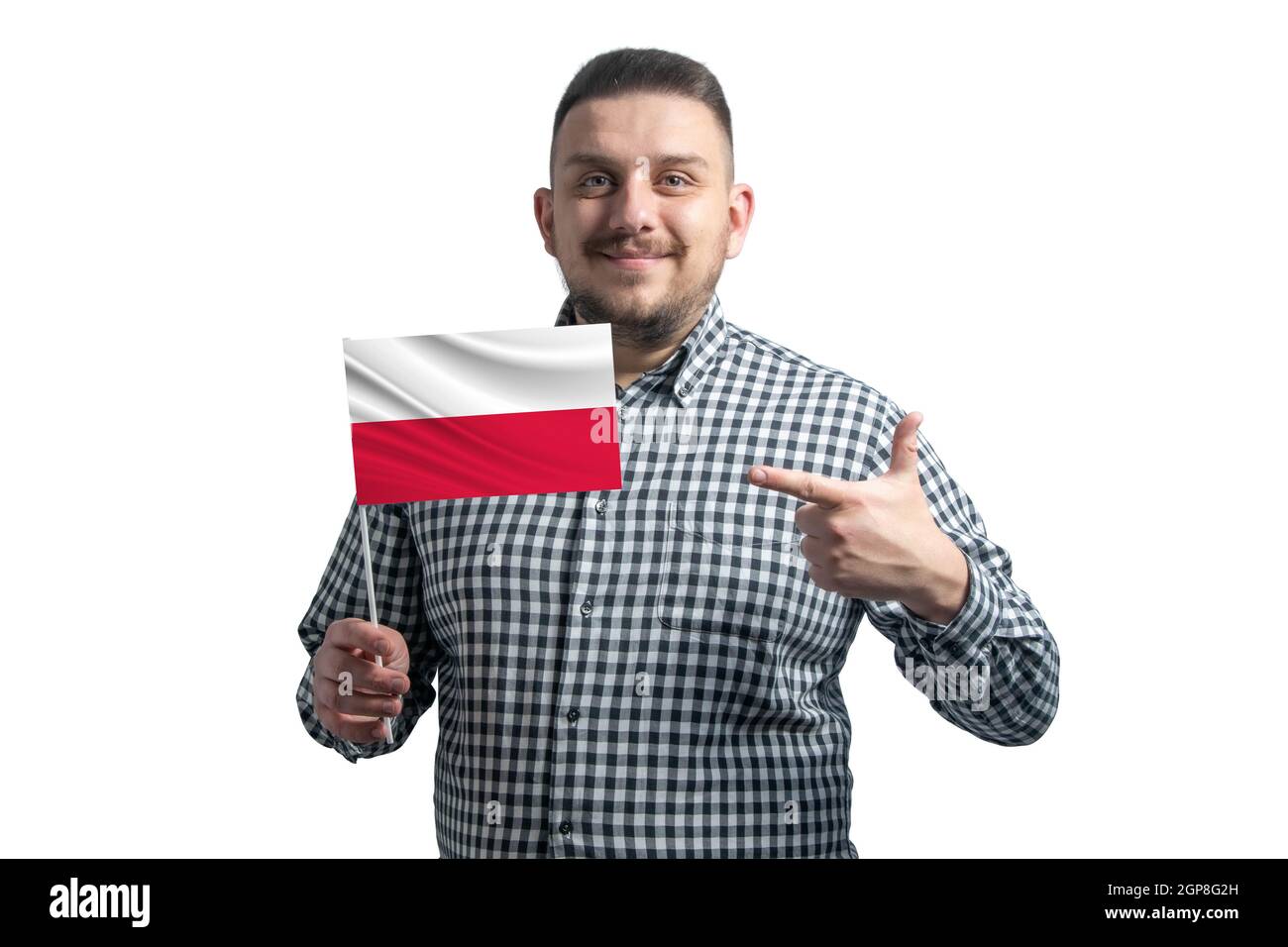 White guy holding a flag of Poland and points the finger of the other