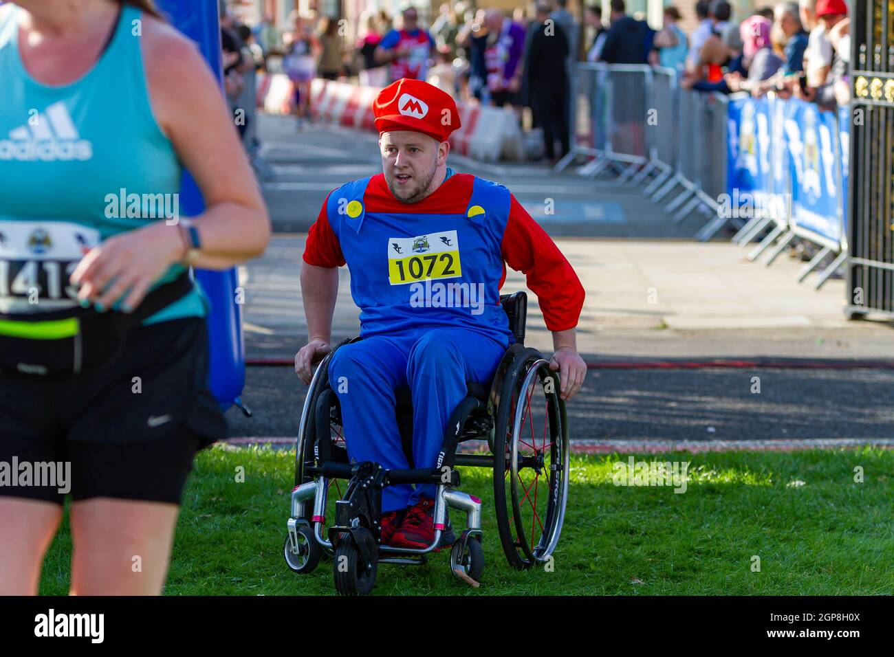 Warrington Running Festival 2021 man in wheelchair dressed as Super