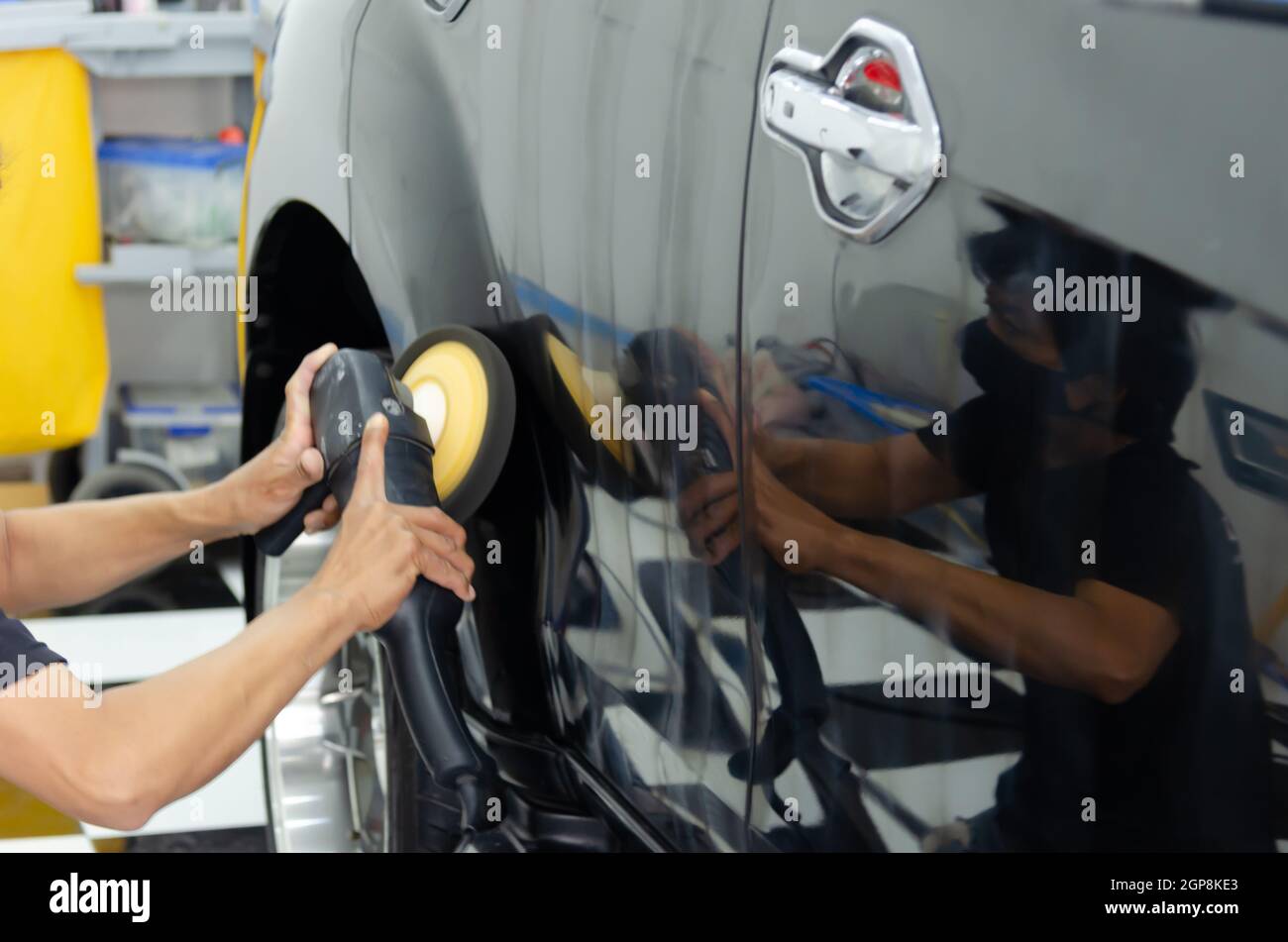 Man hand holding a car polish machine. Car detailing Buffing and wax Stock Photo Alamy