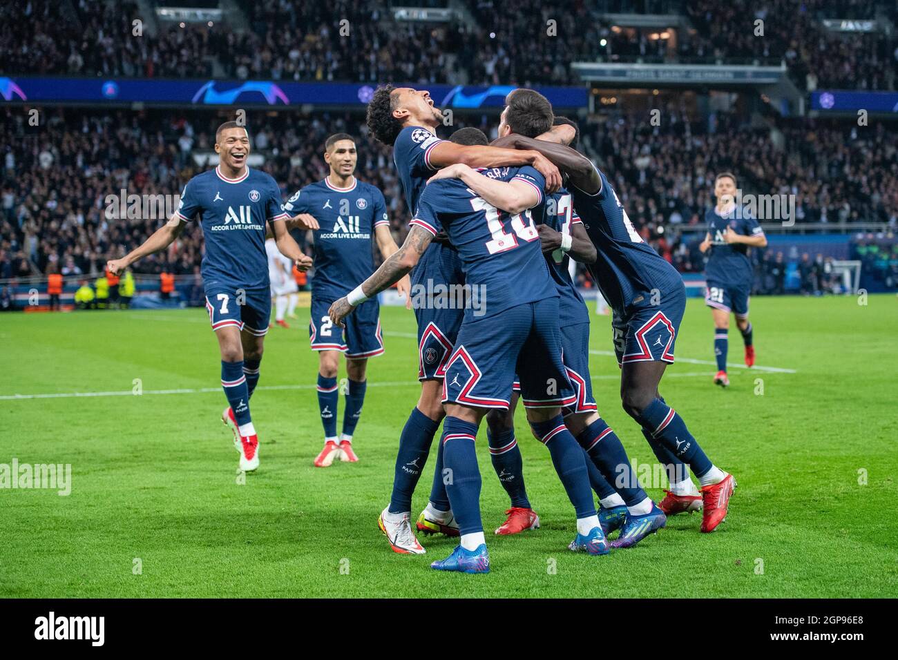 PARIS, FRANCE - SEPTEMBER 28 Lionel Messi of Paris Saint-Germain celebrate hes 1st goal with Marquinhos, Kylian Mbappé and Neymar during the UEFA Ch Stock Photo