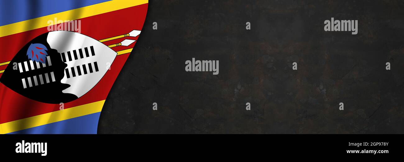 Esvatini flag on concrete wall. Banner with fabric texture of the flag