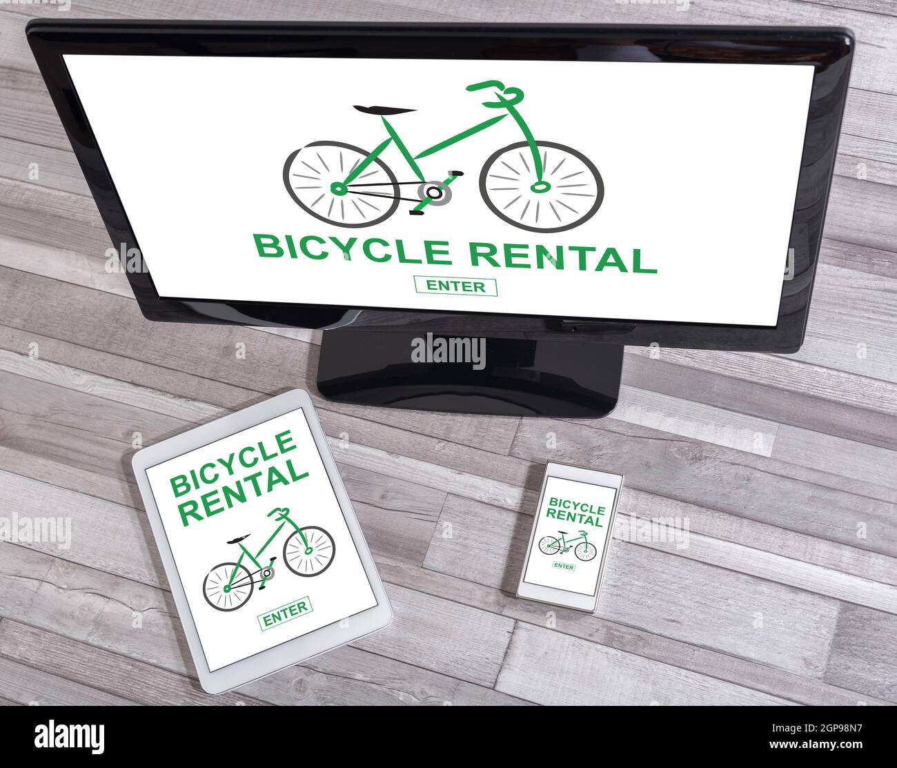 Bicycle rental concept shown on different information technology ...