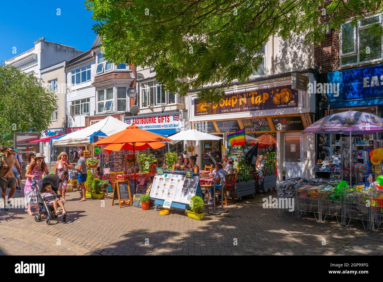View of shops and cafes in Eastbourne town centre, Eastbourne, East