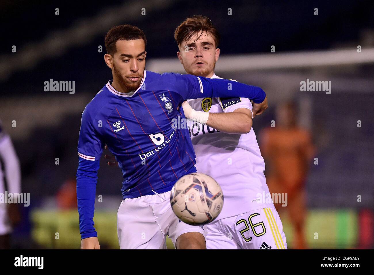 OLDHAM, UK. SEPT 28TH Oldham Athletic's Faysal Bettache and Lewis Bate of Leeds United during the EFL Trophy match between Oldham Athletic and Leeds United at Boundary Park, Oldham on Tuesday 28th September 2021. (Credit: Eddie Garvey | MI News) Credit: MI News & Sport /Alamy Live News Stock Photo
