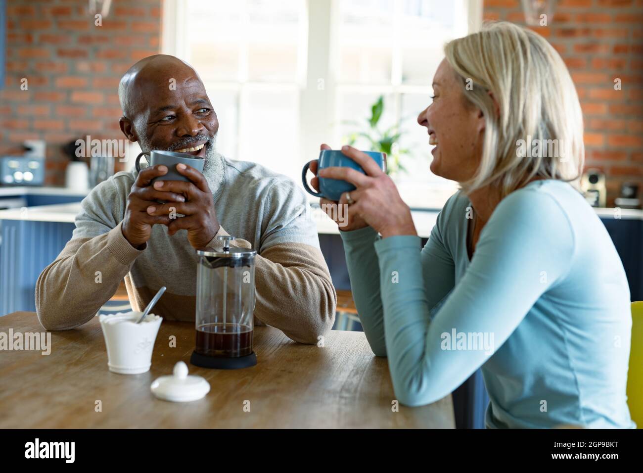 Senior sitting coffee table hi-res stock photography and images - Alamy