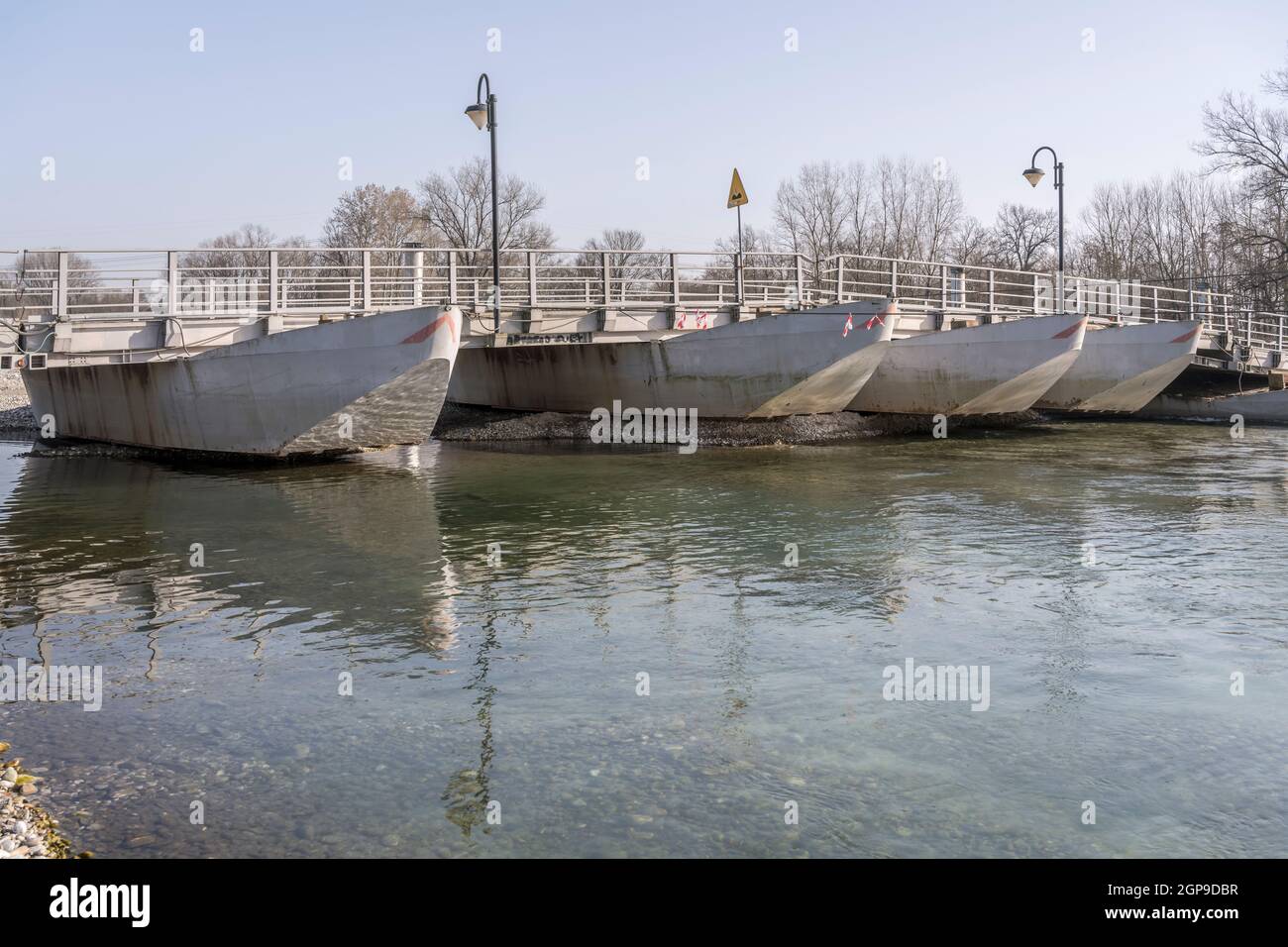 pontoon bridge on Ticino river clear waters, shot on bright winter day at Bereguardo, Pavia, Lombardy, Italy Stock Photo
