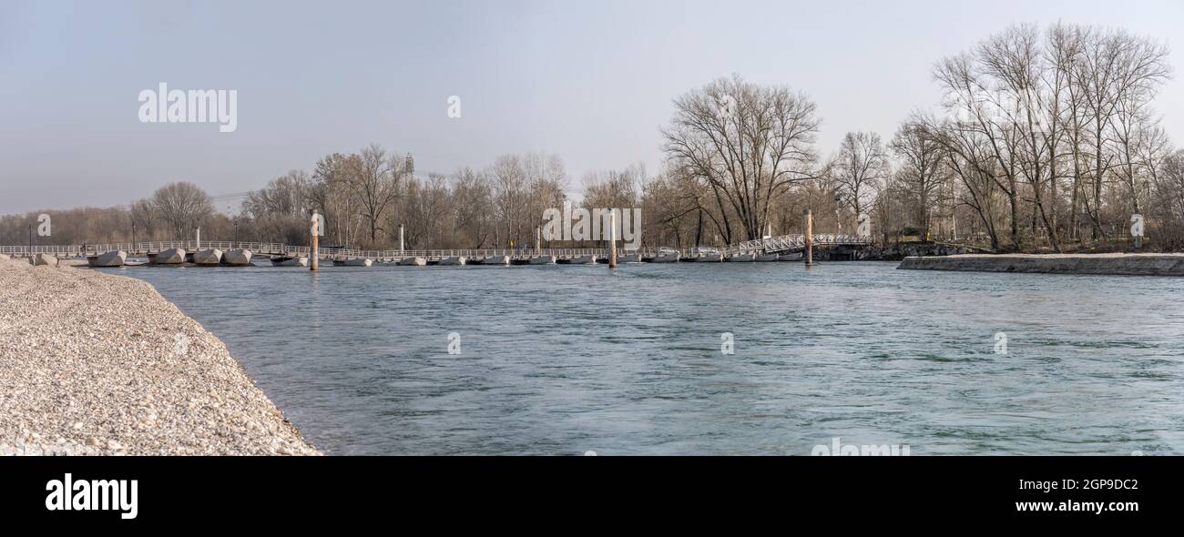 Ticino river and pontoon bridge, shot on bright winter day at Bereguardo, Pavia, Lombardy, Italy Stock Photo