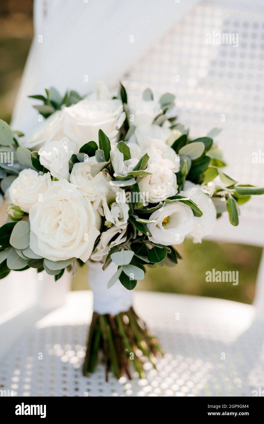 elegant wedding bouquet of fresh natural flowers and greenery Stock Photo -  Alamy