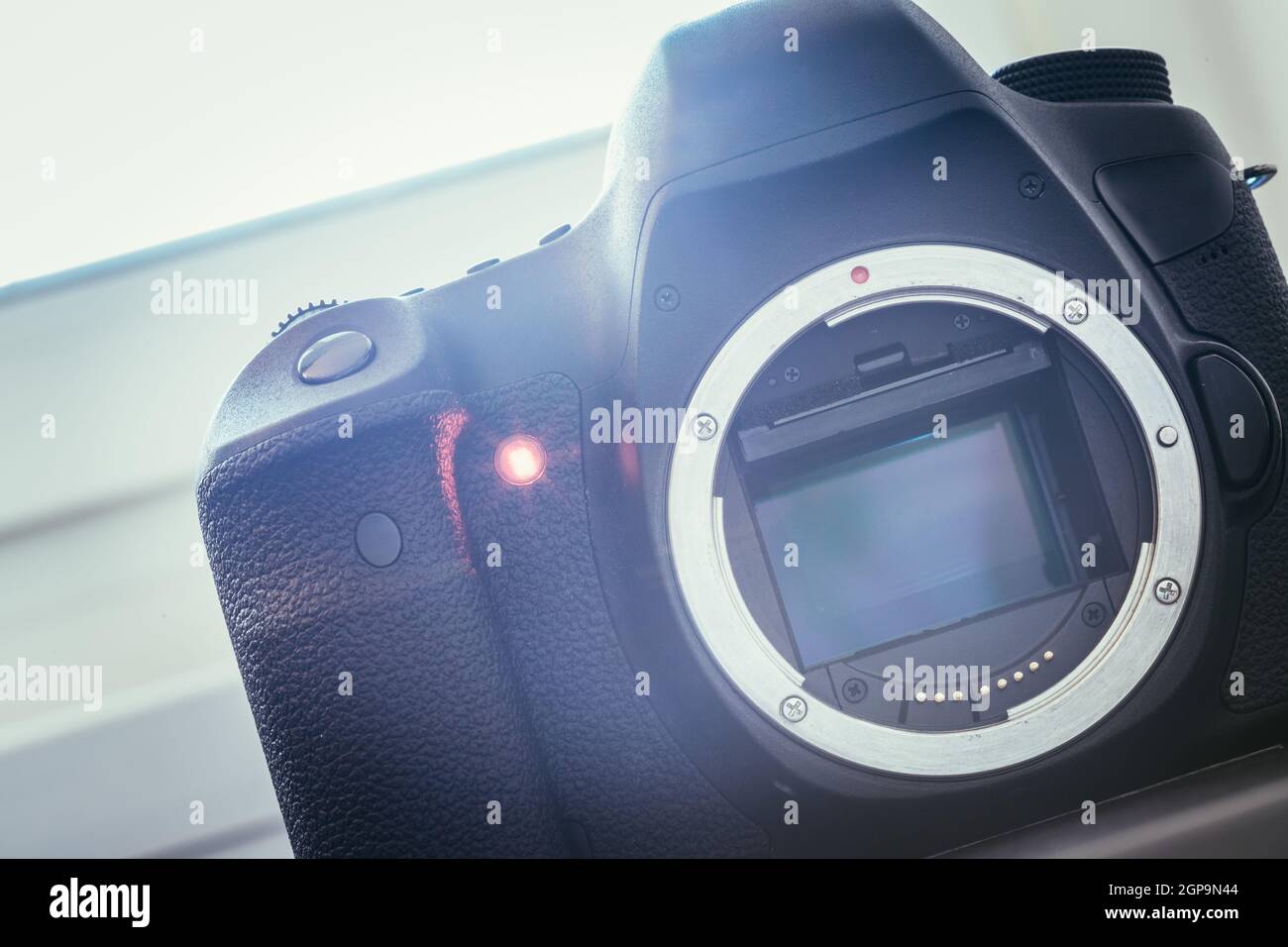 Professional reflex camera on a table, camera sensor Stock Photo