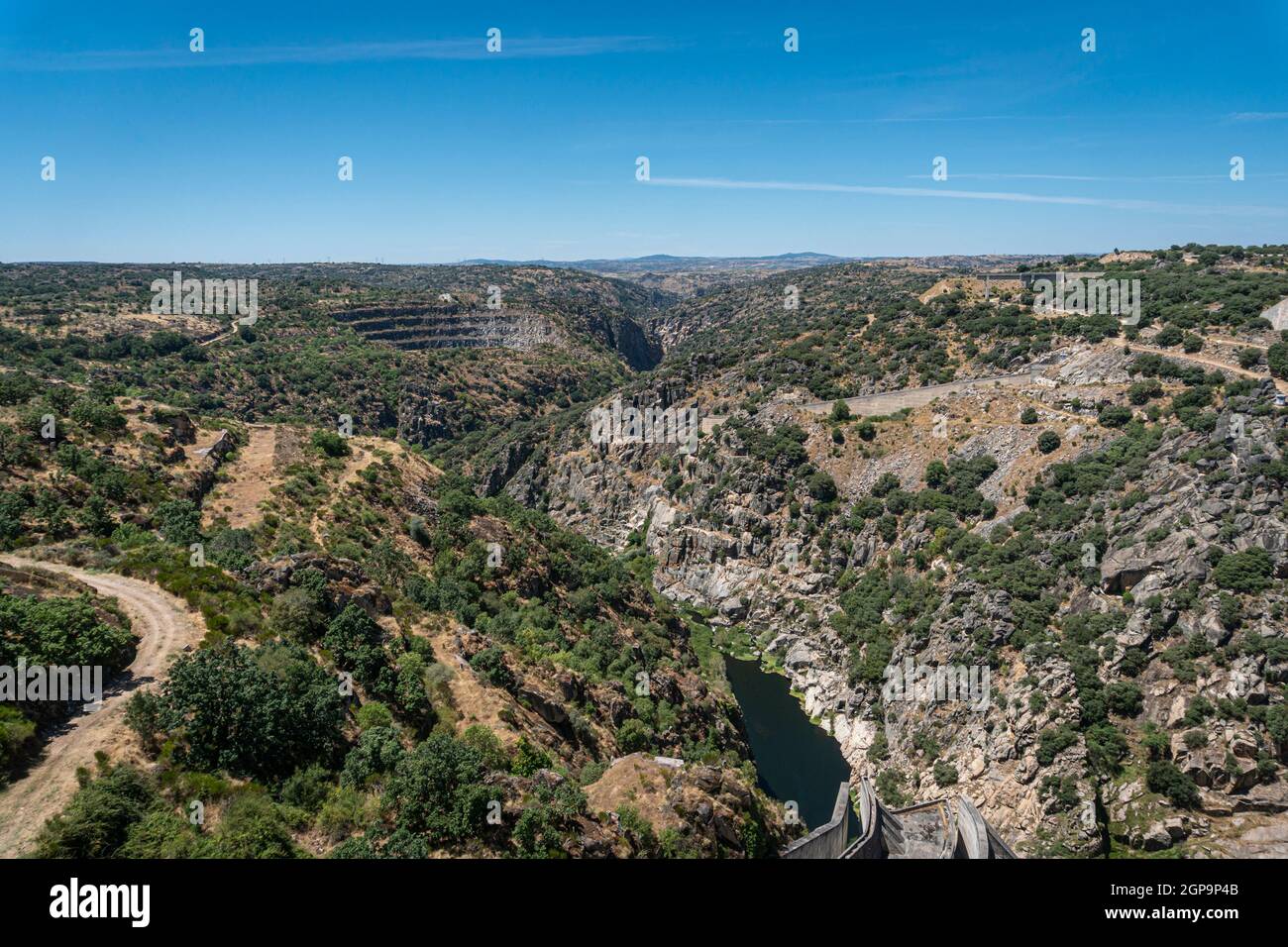 View across the valley from Almendra (Almond) Dam, also known as Villarino Dam, in Salamanca, Spain Stock Photo