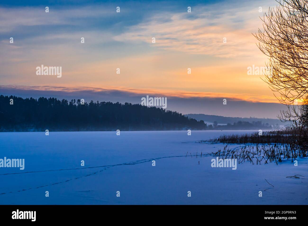 Snowy Winter Landscape with Magical Twilight over Frozen Lake Stock ...