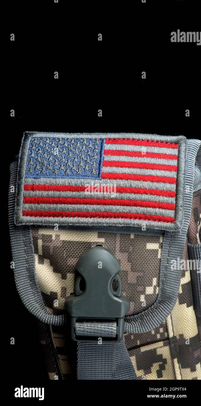 American flag, old glory patch on camouflage with room for your type. Stock Photo