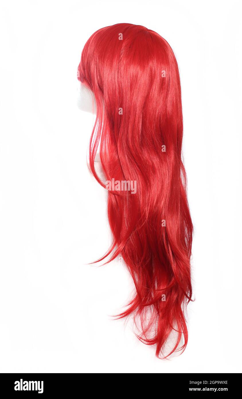 Red Anime Style Wig on mannequin head isolated on white background Stock Photo