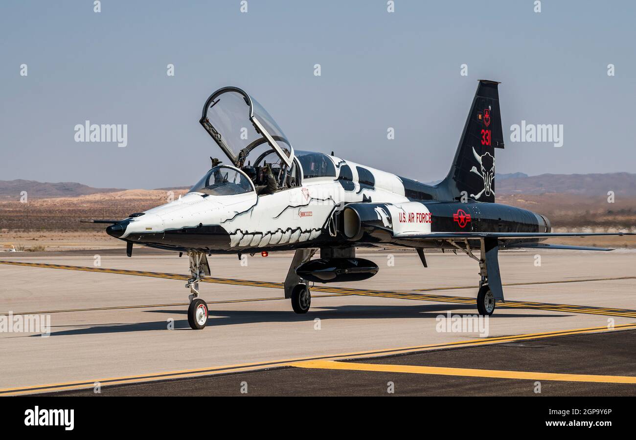 A T-38C Talon aircraft, the flagship of the 87th Flying Training Squadron, Laughlin Air Force Base, Texas, taxis after landing at Nellis AFB, Nevada, Sept. 24, 2021. The T-38C is a supersonic jet trainer aircraft primarily used for specialized undergraduate pilot training. (U.S. Air Force photo by William R. Lewis) Stock Photo