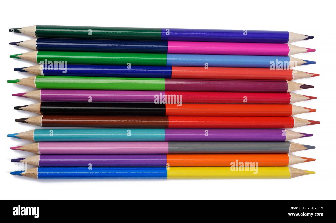 sharpened colored wooden pencils on an white background, top view Stock Photo