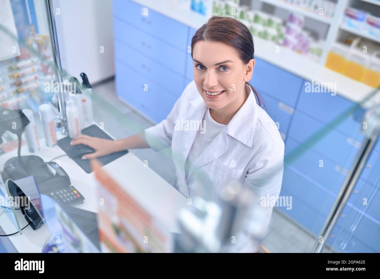 Pharmacist at her desk hi-res stock photography and images - Alamy