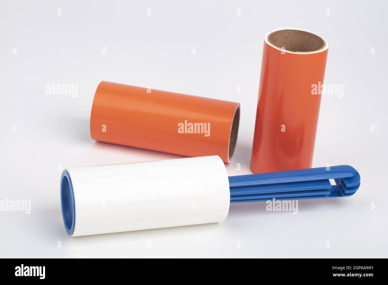 Lint Roller with blue handle on bright background Stock Photo