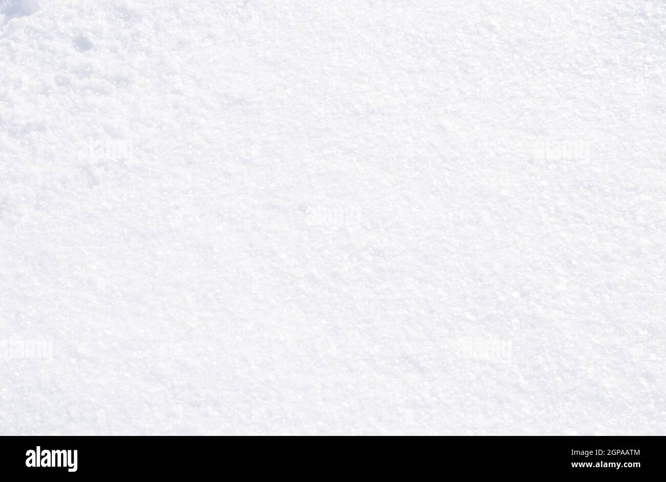 Snow makes a nice white background with a bit of texture. Lots of copy space available here with enough texture to make it interesting. Stock Photo