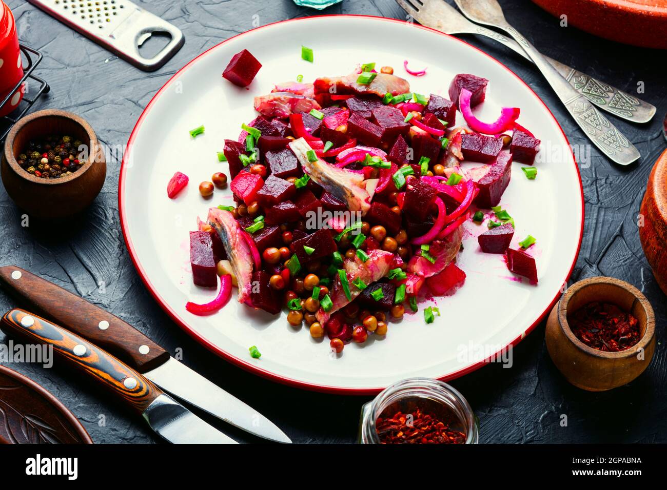 Salad with herring,beets,onions and green peas.Salad of salted herring