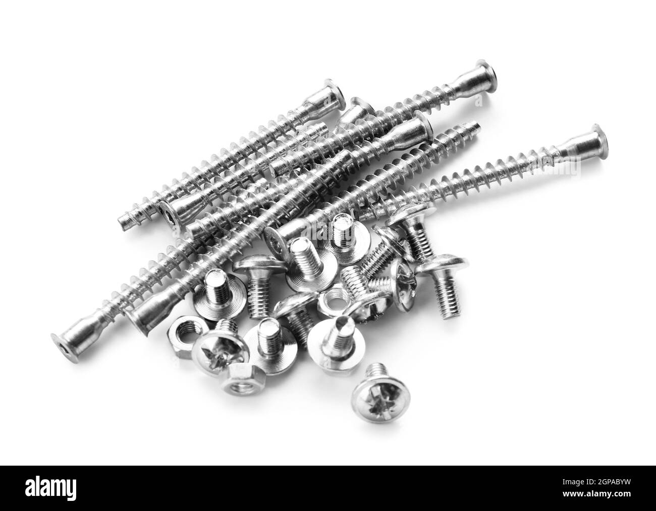 Pile of bolts, screws and nuts on white background Stock Photo