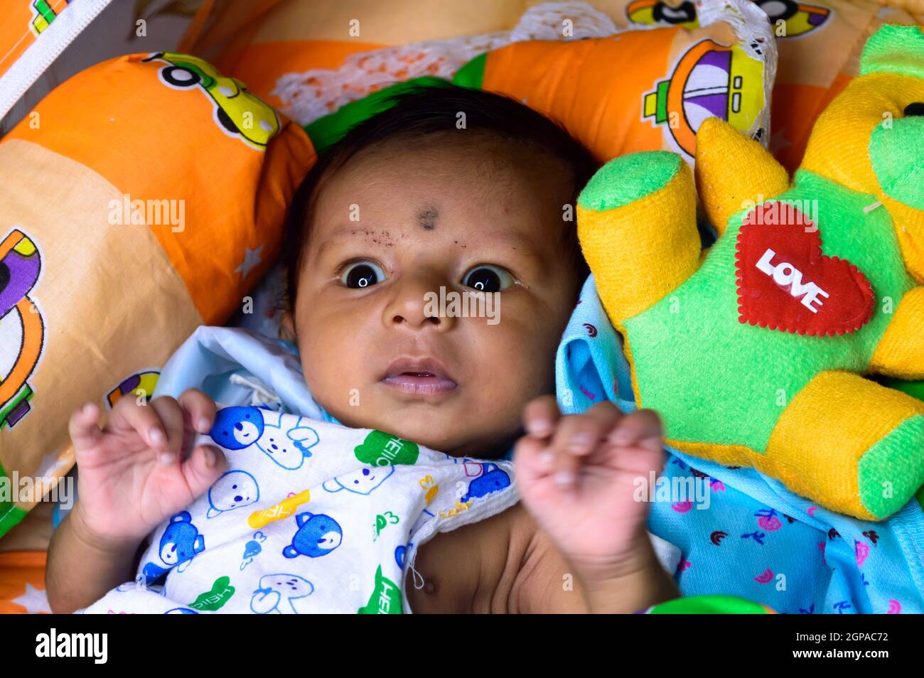 Indian baby girl looking above hires stock photography and images Alamy