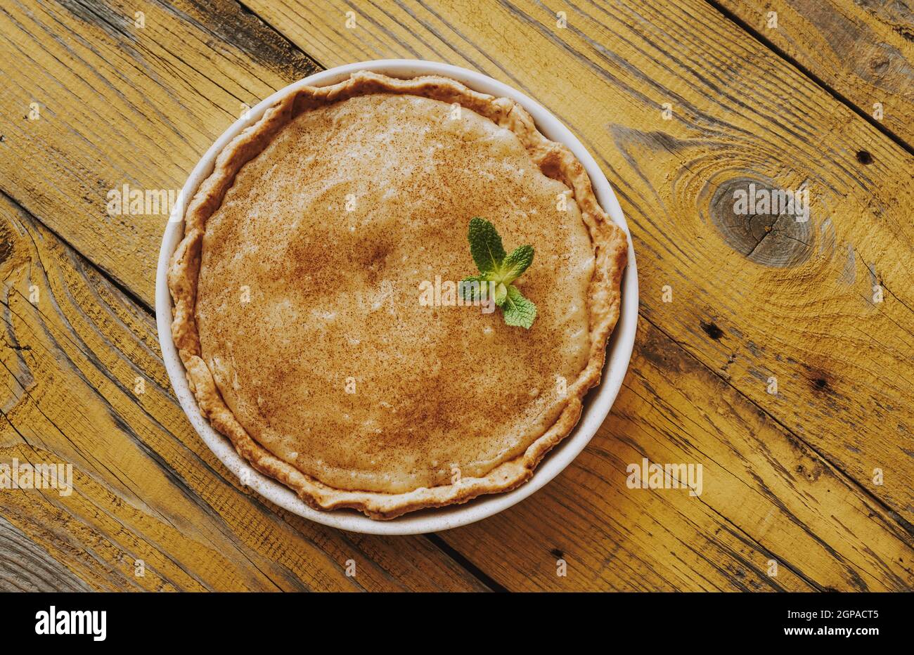 Indiana Sugar Cream Pie on the wooden background Stock Photo