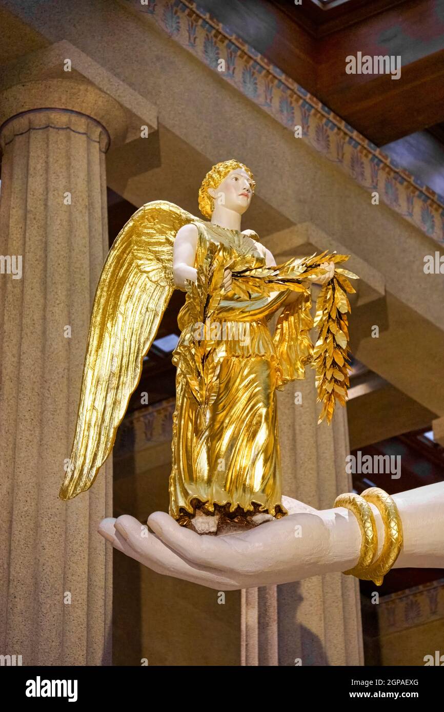 Looking up at the hand of the statue of the Goddess Athena holding Nike  inside the Parthenon in Nashville's Centennial Park Stock Photo - Alamy