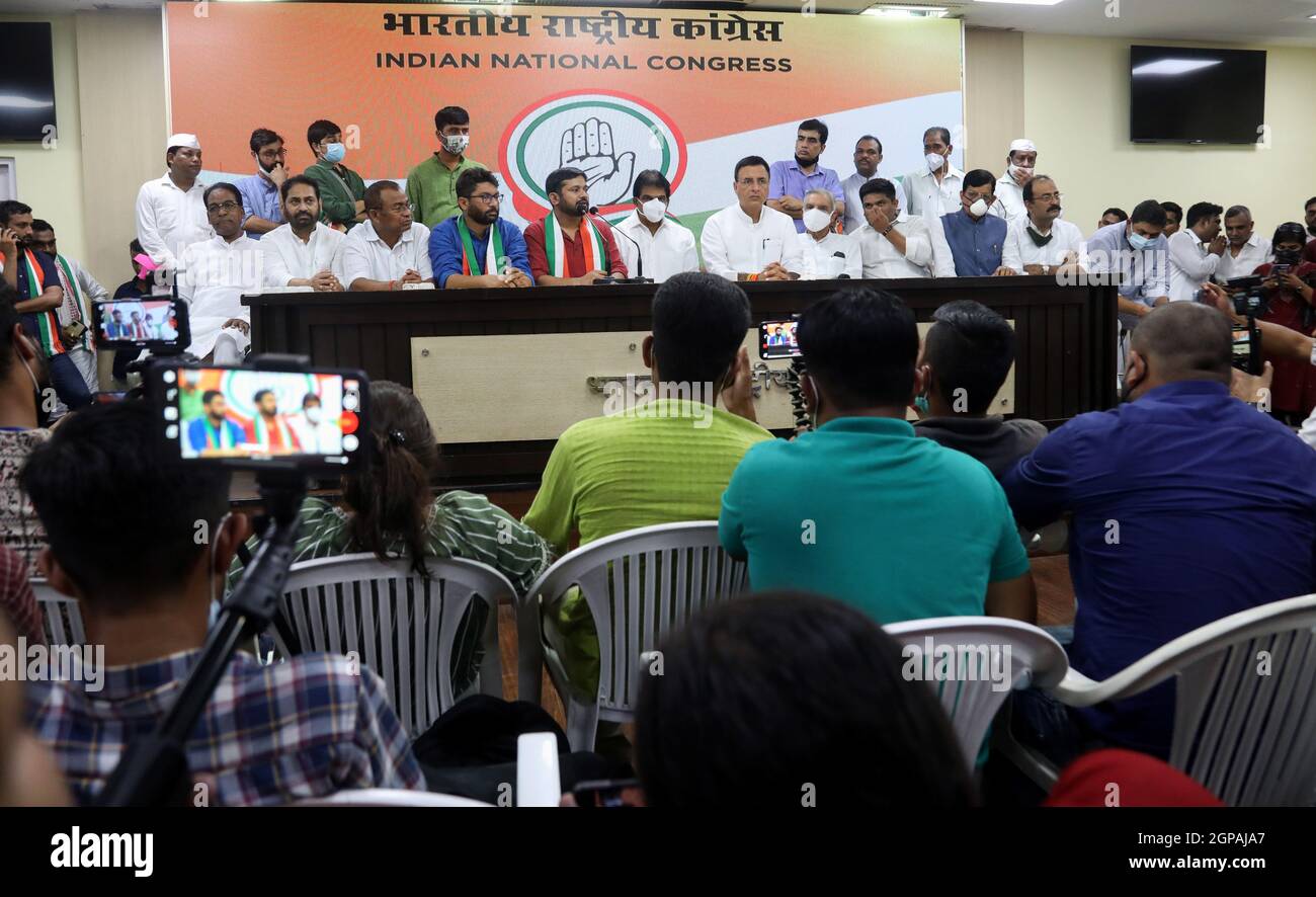 Kanhaiya Kumar Indian politician, Jignesh Mevanimember of the Gujarat legislative assembly, and K. C. Venugopal Member of rajya sabha are seen at a press conference. Kanhaiya Kumar, Former JNU (Jawaharlal Nehru University) student's union President and CPI (Communist Party of India) leader, and Jignesh Mevani join Indian National Congress party at Congress party headquarters. Jignesh Mevani is an independent MLA (Member of Legislative Assembly) from Gujrat (Vadgam constituency). Kanhaiya and Jignesh vocal against the Prime Minister, Narendra Modi central government. Stock Photo