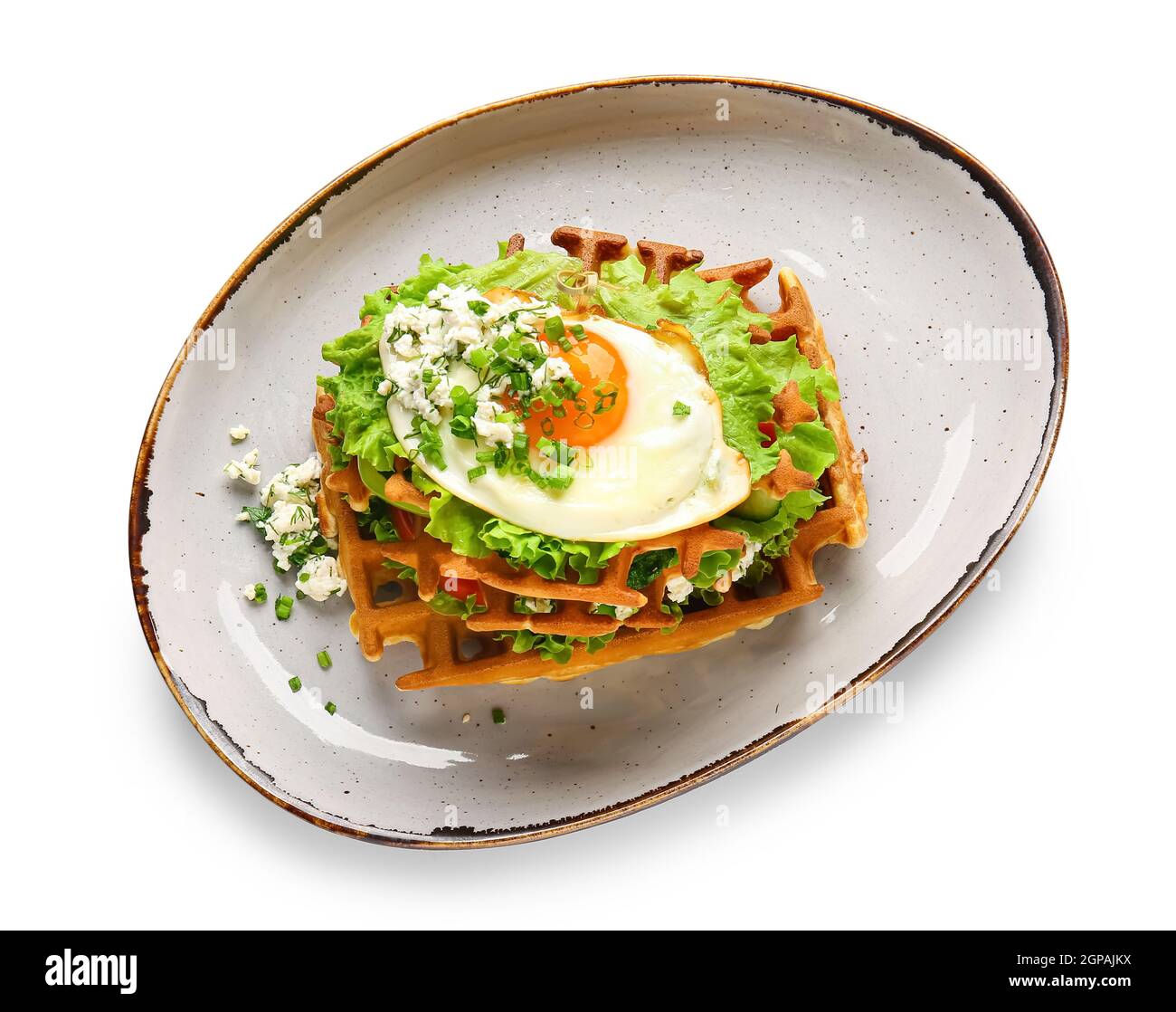 Delicious Belgian waffles with egg on white background Stock Photo Alamy