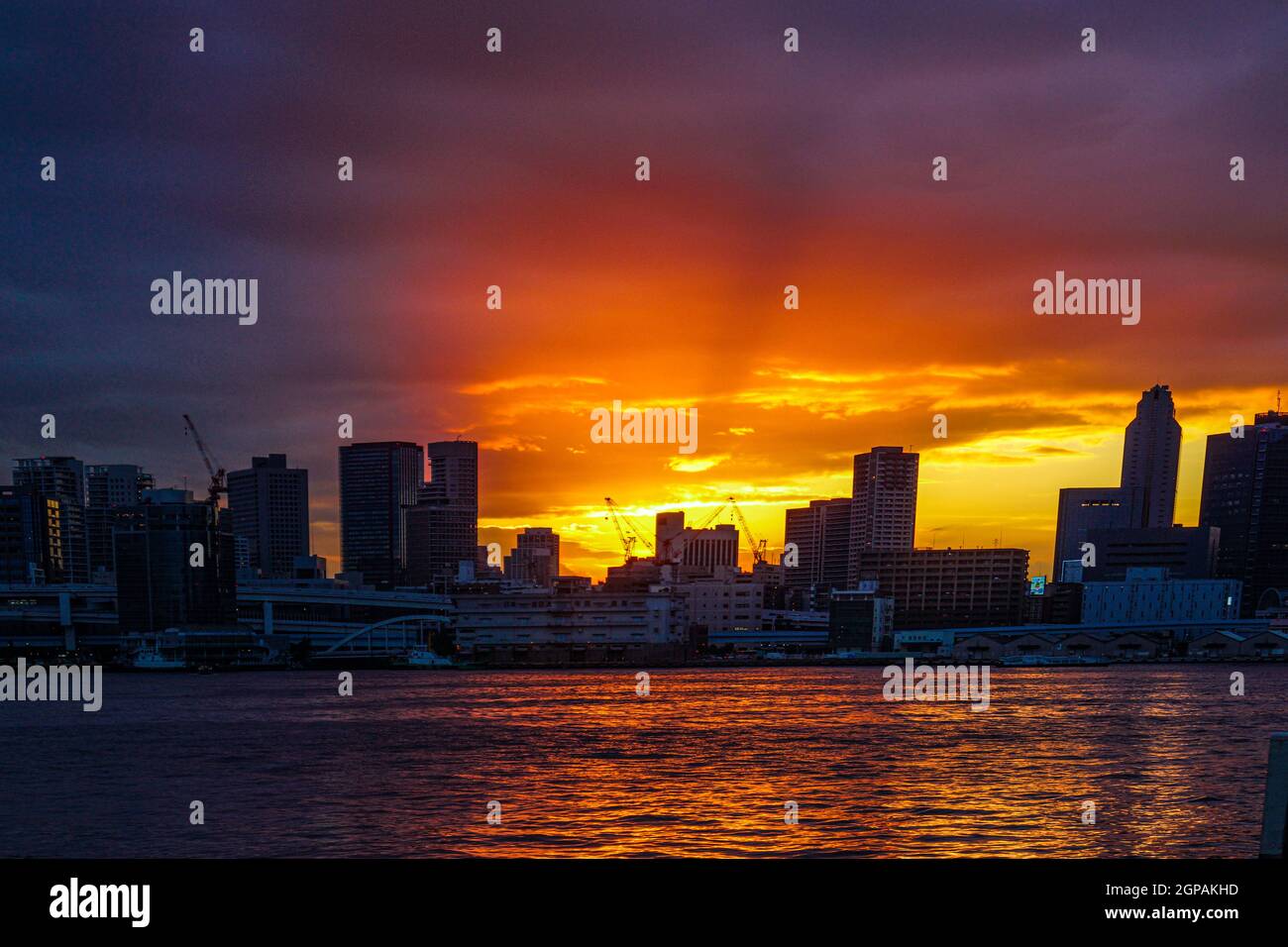 Tokyo skyline and sunset as seen from Harumi Pier. Shooting Location: Tokyo metropolitan area Stock Photo