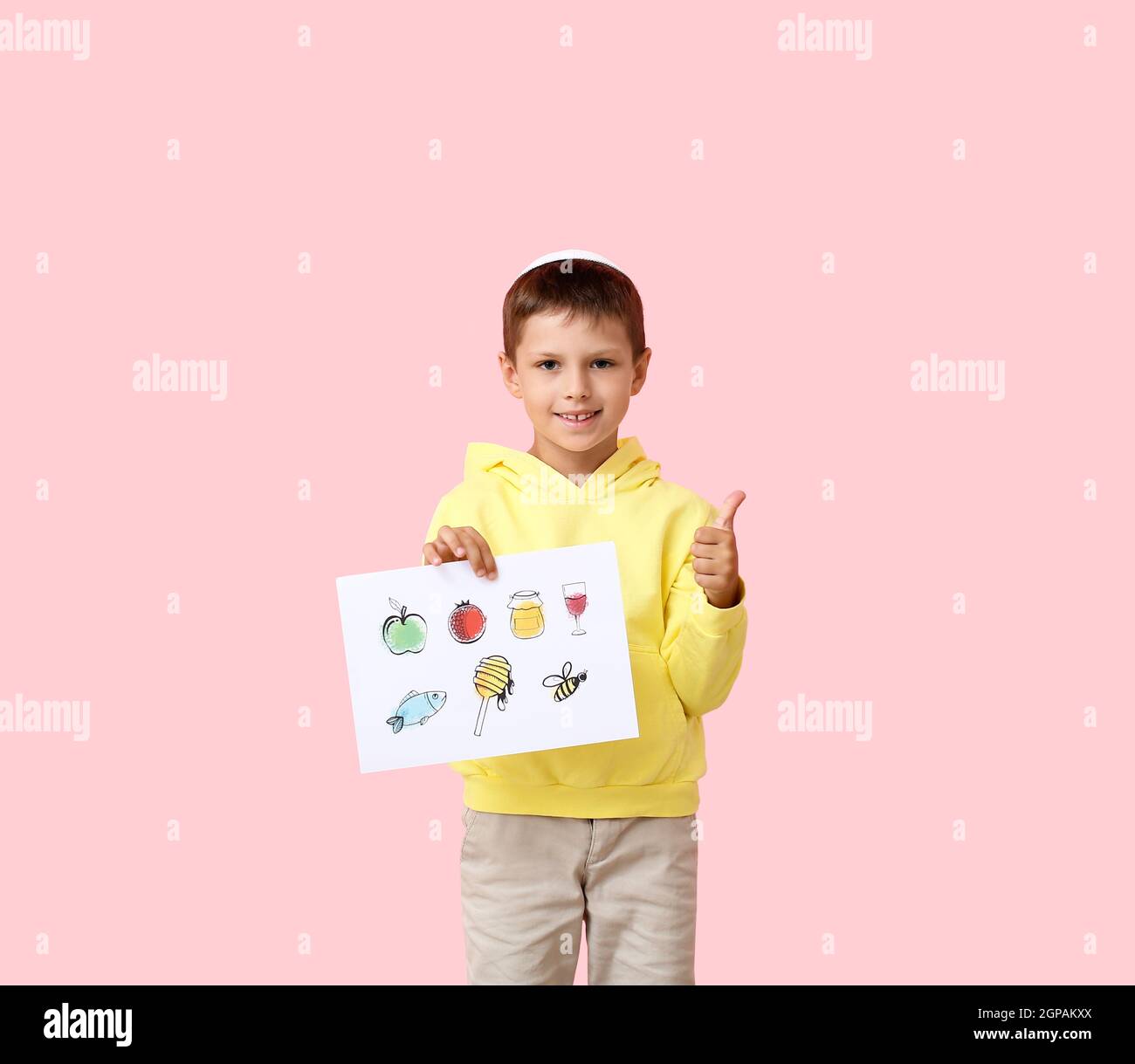 Little boy holding paper with drawings for Rosh Hashanah (Jewish New ...