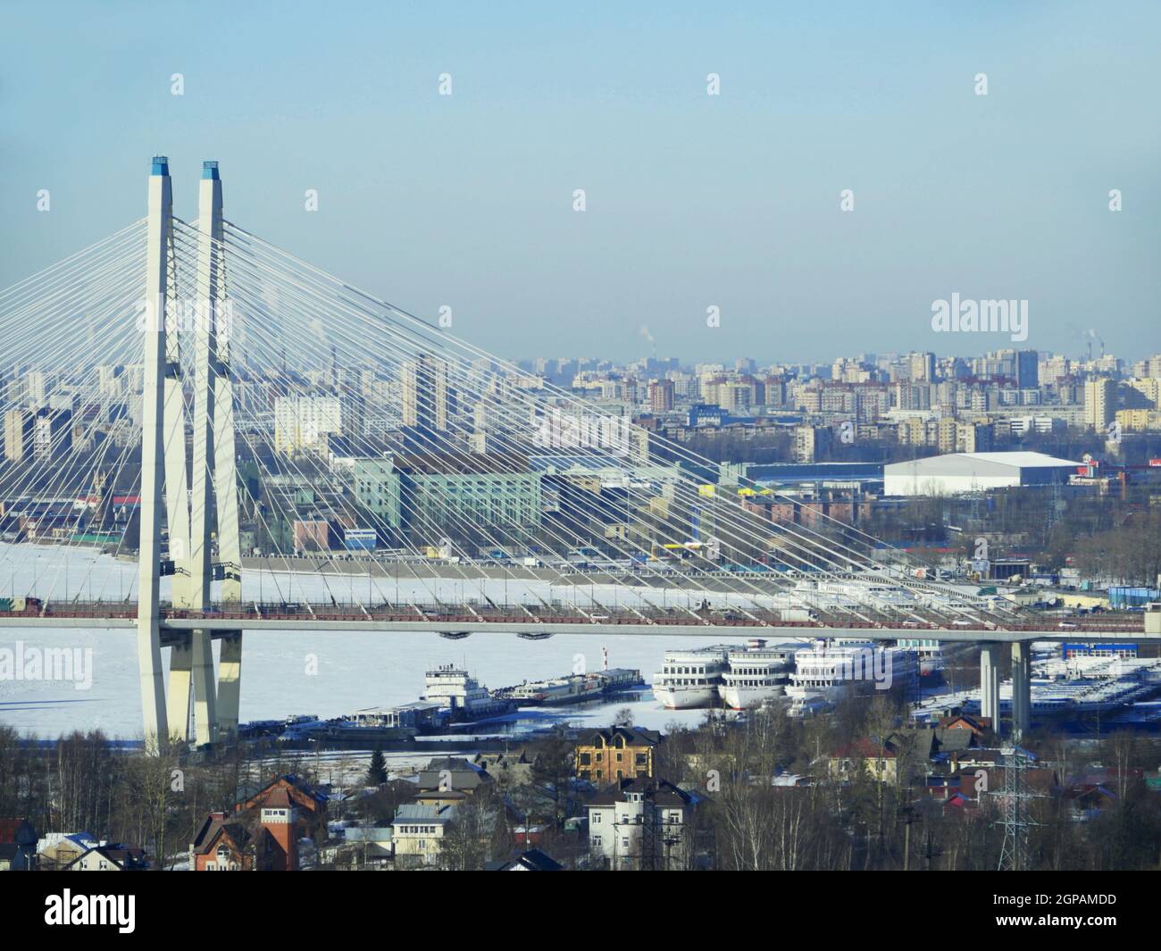 St. Petersburg in the winter, foreground  cobweb of cables, cable-stayed bridge and a pier, aerial view Stock Photo
