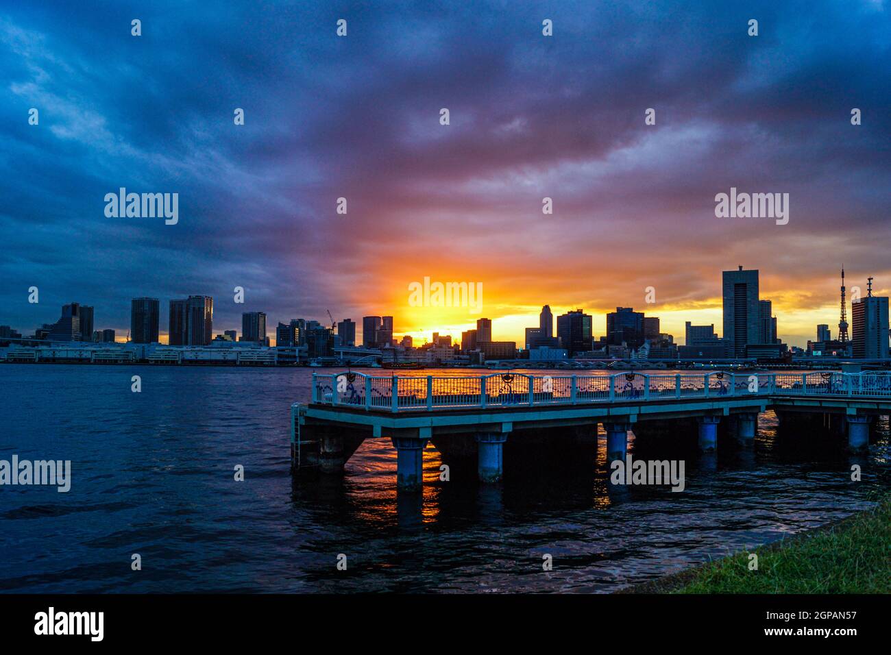 Tokyo skyline and sunset as seen from Harumi Pier. Shooting Location: Tokyo metropolitan area Stock Photo