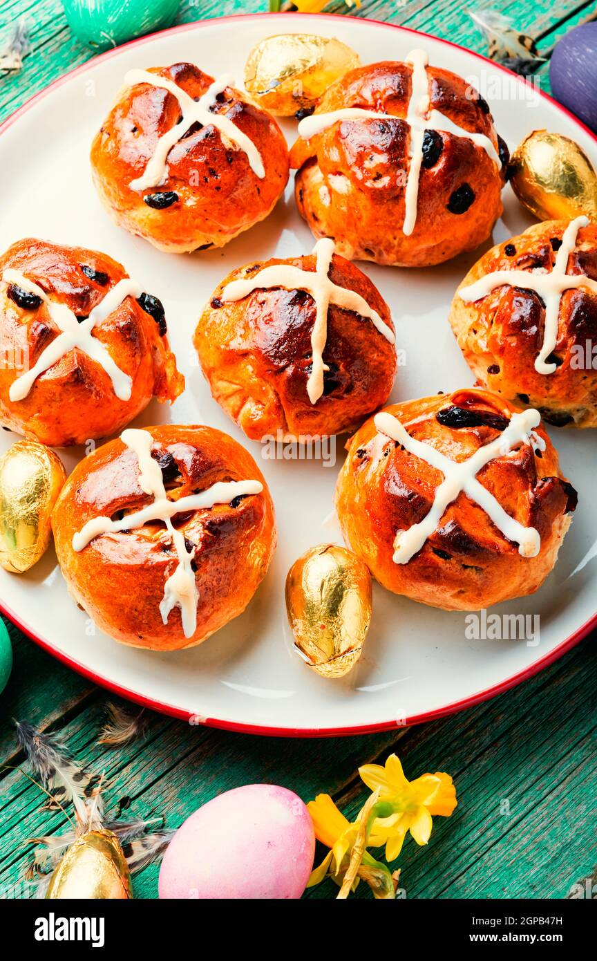 Easter hot cross buns and easter decor.Easter baked goods Stock Photo