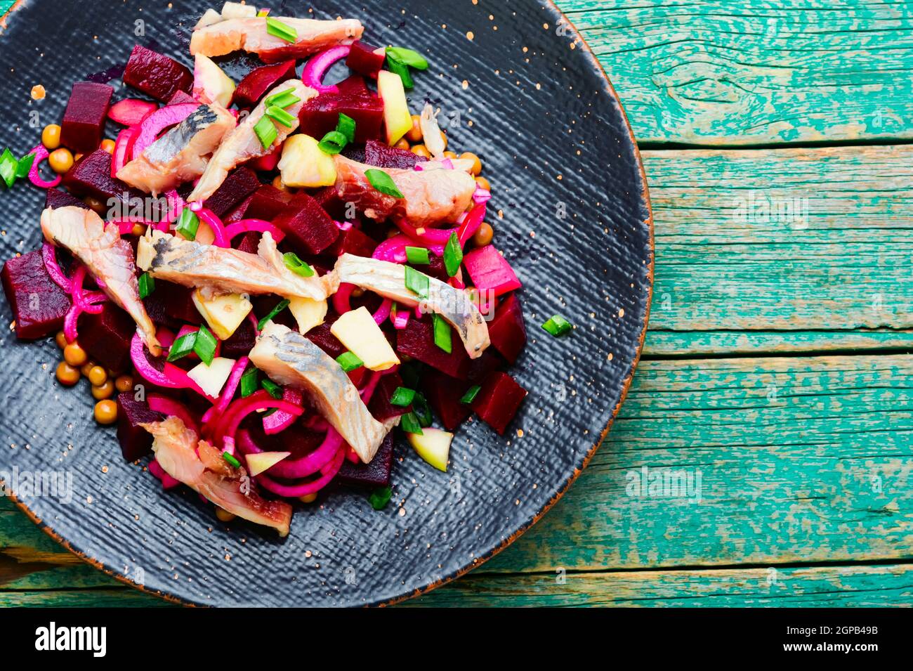 Salad with herring,beets,onions and green peas Stock Photo Alamy